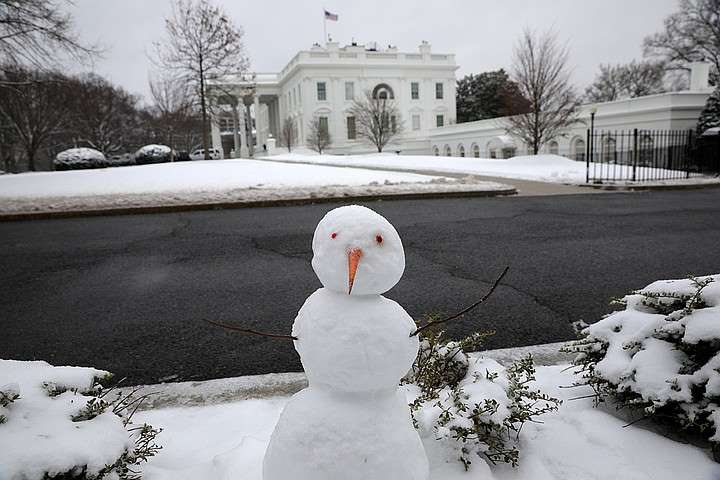 Washington and New York covered with snow