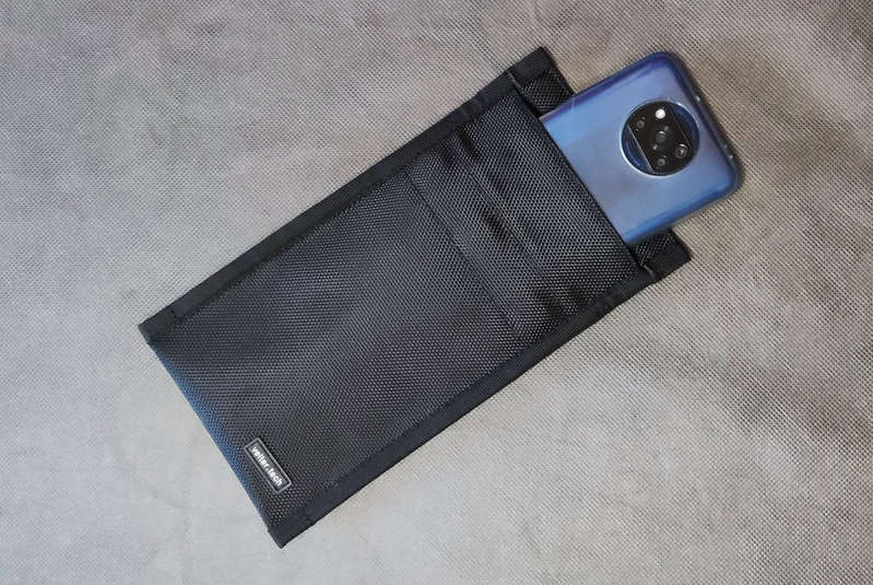 How to completely isolate a smartphone from the outside world: examining shielding cases