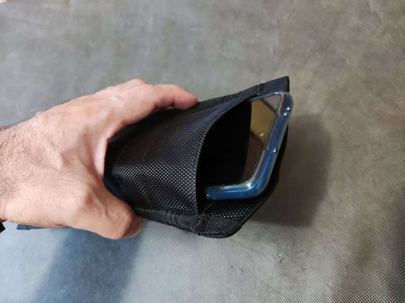 How to completely isolate a smartphone from the outside world: examining shielding cases