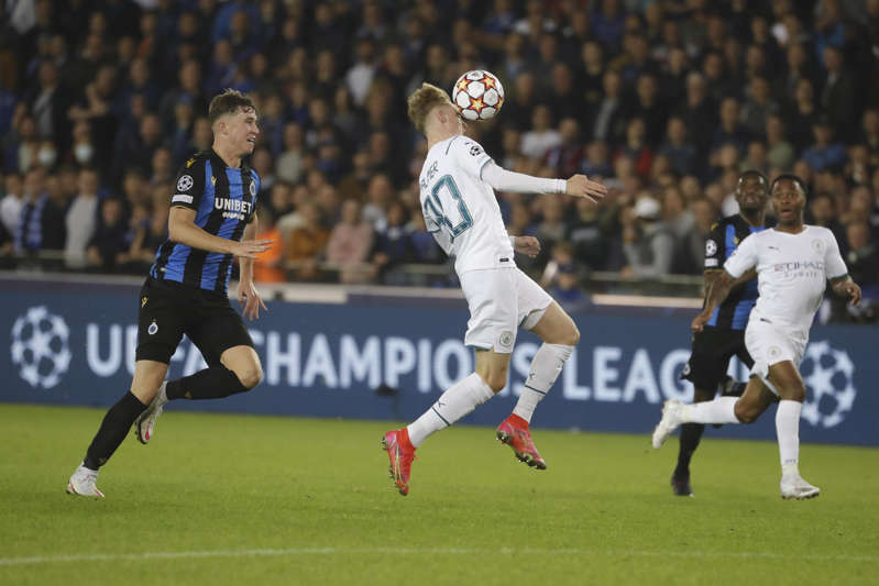 Manchester City celebrate a 5-1 victory in Bruges